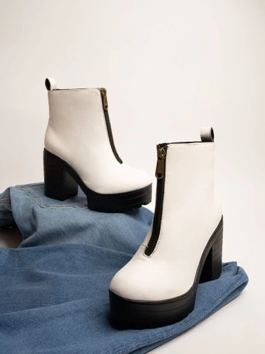Stylestry Womens & Girls White Solid Zipper Heeled Boots