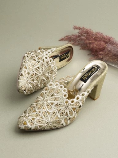 Stylestry Womens & Girls Gold-Toned & Silver-Toned Embellished Ethnic Block Mules with Laser Cuts