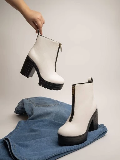 Stylestry Womens & Girls White Solid Zipper Heeled Boots