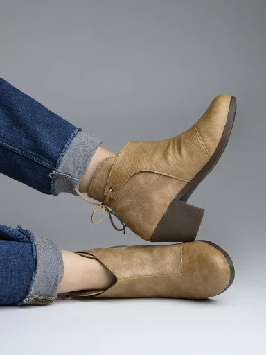 Stylestry Womens & Girls Beige Solid Heeled Boots